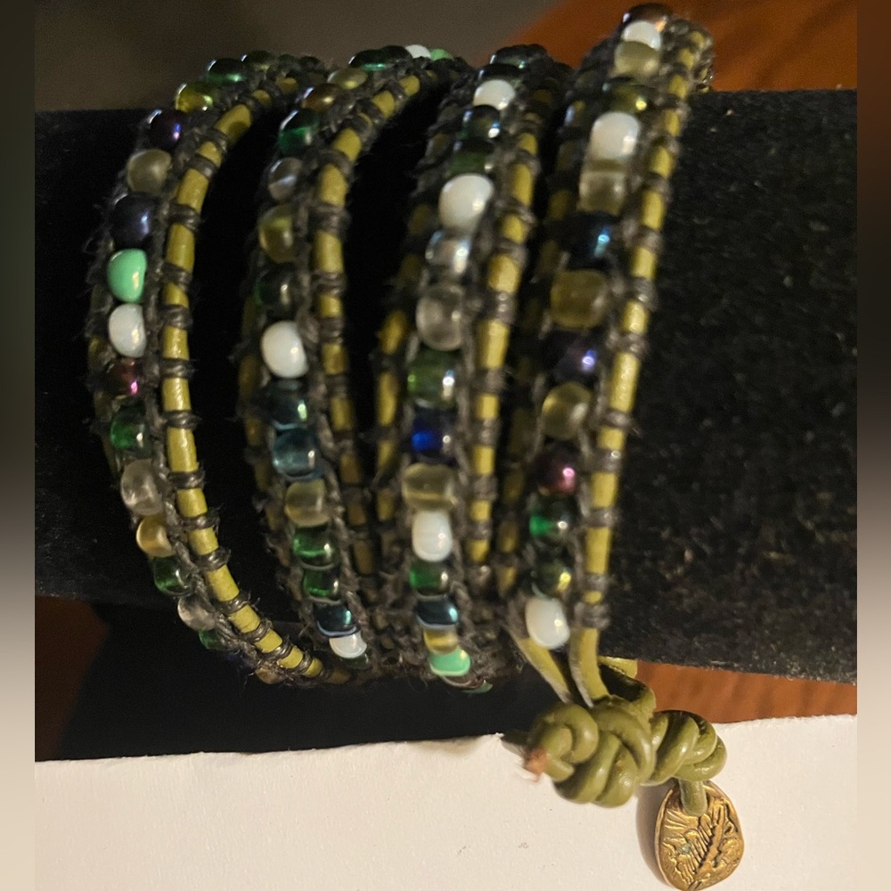 Handcrafted multiwrap beaded/leather bracelet. 30” olivegreen leath, glass beads